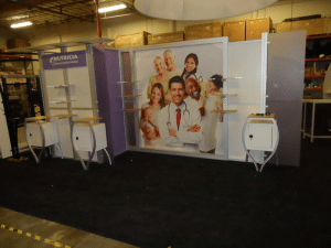 Custom hybrid exhibition stand with fabric graphics and reception counter-resized-600