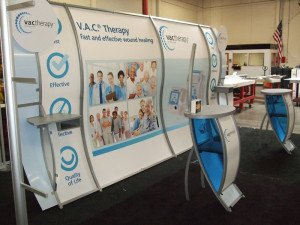 VK-1512 Perfect 10 portable trade show display with tension fabric graphics and curved frame and kiosks