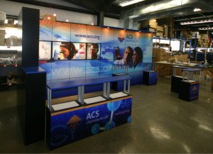 multi quad trade show display with back lit panels