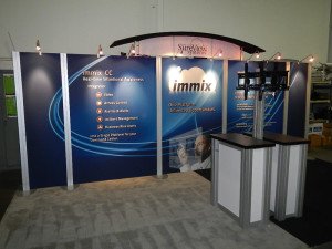 rental 10x20 hybrid trade show display with double sided kiosks and locking counters