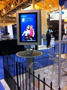 rental 30x40 island hybrid exhibit with cell phone charging station