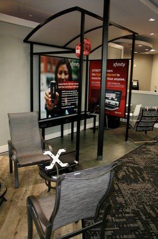 Retail Store Fixtures - Xfinity display with graphics, furniture and great color selection