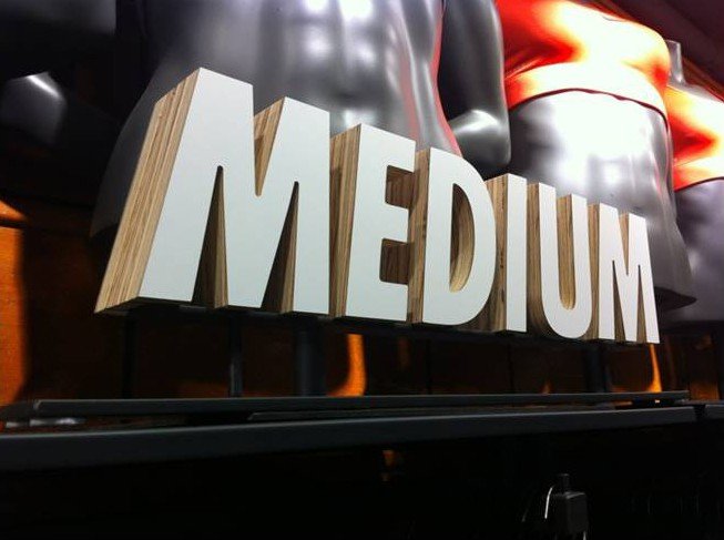 Store Fixtures - Display by Medium showing great branding and logo placement.