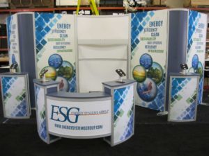 Designing a new trade show exhibit? check out the eSmart ECO-4073 with Recycled Aluminum Extrusion Frame, Laminate Tower Infills, LED Lighting, Large Monitor Mount and (2) ECO-38C Storage Counters. Reconfigures to 10 ft. and 20 ft. Inlines