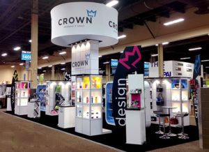 multiquad-exhibit-20x50 with product shelves and plenty of room for trade show booth staffing to do their jobs
